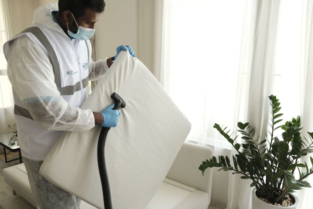 vacuuming mattress bedroom